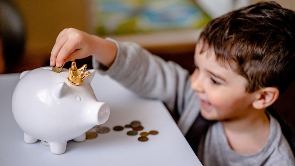 Kind met spaarpot Kind met spaarpot