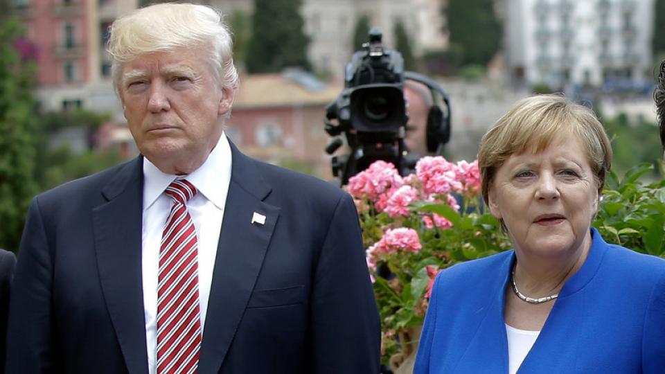 Donald Trump en Angela Merkel